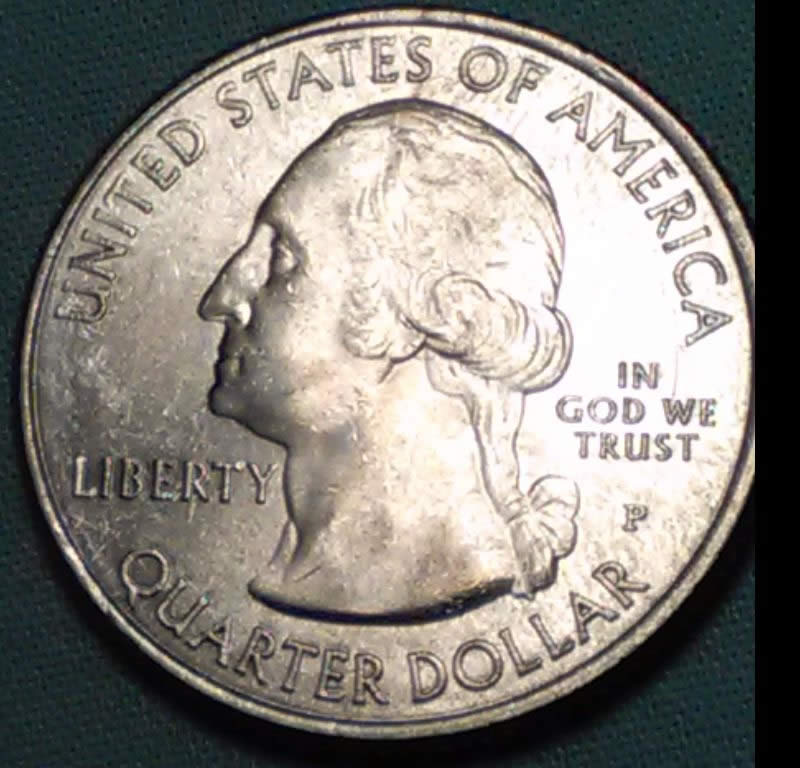 2015-Saratoga-Quarter-With-Die-Chip-Between-Finger-And-Sword-Handle